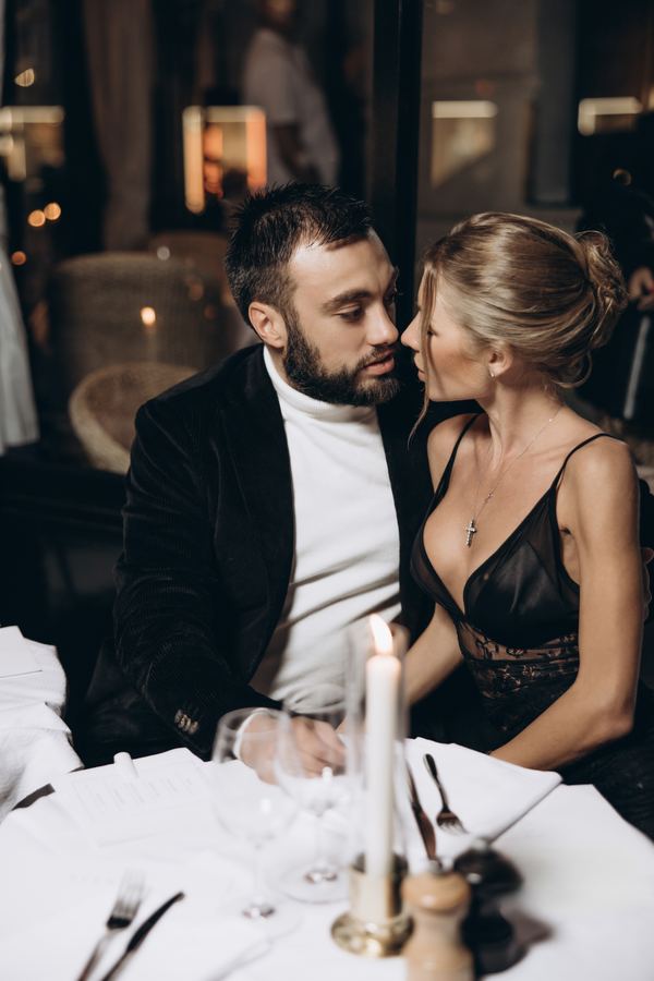 Couple, restaurant interior, Paris